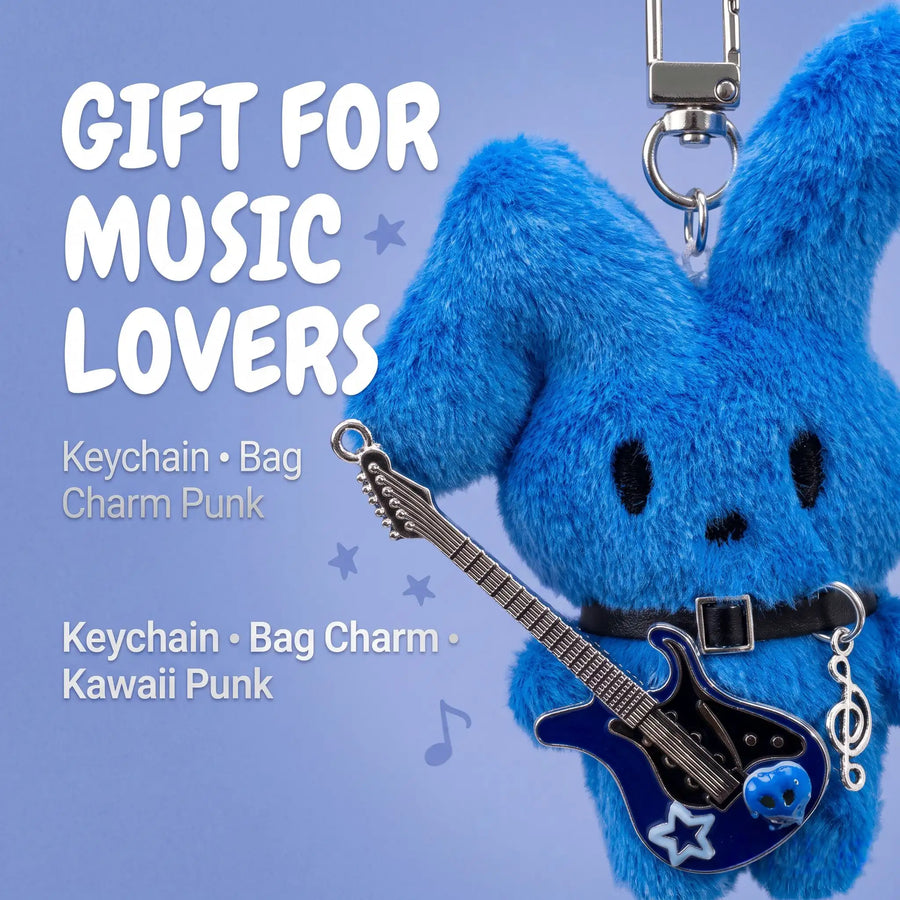 A blue guitarist bunny plush charm with a tiny blue electric guitar against a light blue background.