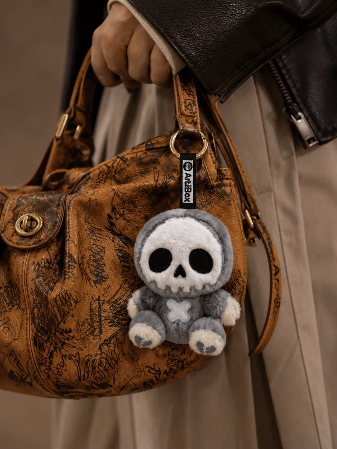 How to Style Plush Bag Charms on Backpacks, Totes & Crossbody Bags