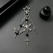 Gothic Skull and Cross Bag Charm featuring skull, cross, and bat designs in silver on a dark background.