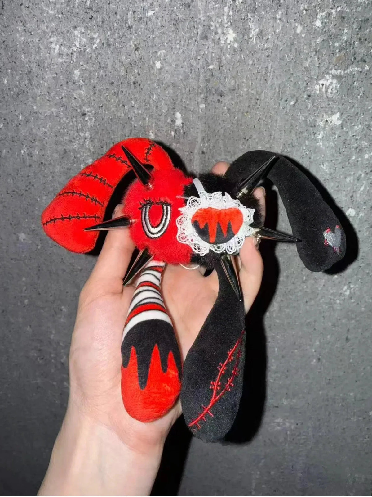 Rivet Punk Rabbit plush charm showcasing punk style with red and black colors and unique four ears.