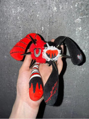 Rivet Punk Rabbit plush charm showcasing punk style with red and black colors and unique four ears.