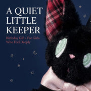 Listening black cat plush toy with expressive eyes and a pink bow, perfect gift for girls who appreciate unique plush toys.
