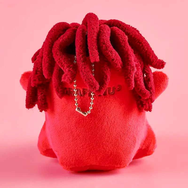 Monster Crew Plush Bag Charm featuring a cute round shape and vibrant red plush design, ideal for spooky accessory lovers.