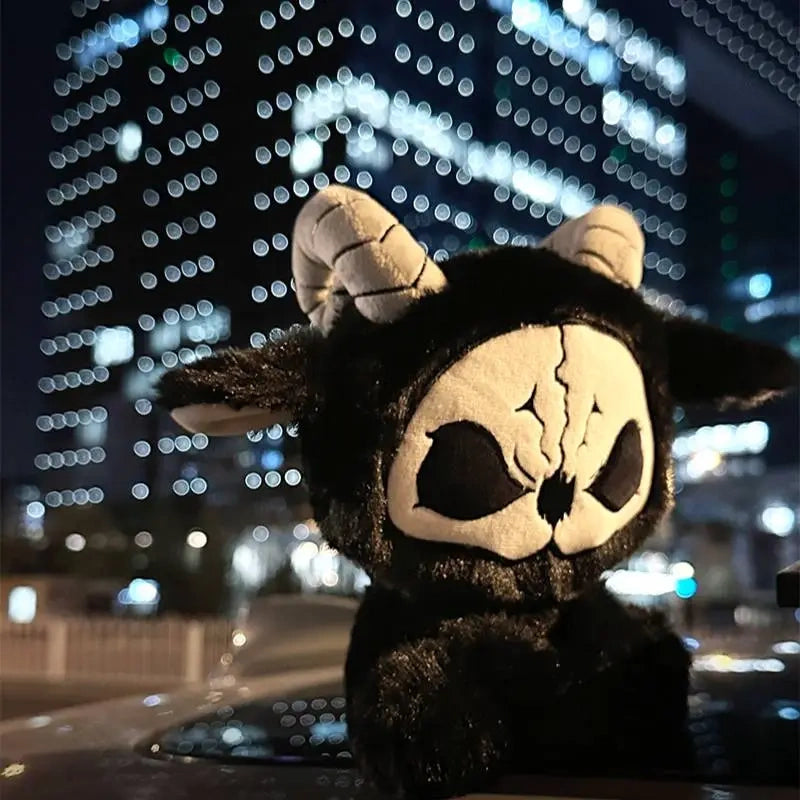 Dark Envoy Reaper Plush - Buu Evil figure against a city backdrop at night, showcasing its cute design.
