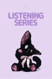 Listening black cat plush toy from the Listening Series with expressive eyes on a pastel background.