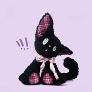 Listening black cat plush toy with expressive eyes and a pink bow, featuring plaid details.