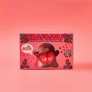 Magnetic angel and devil plush charms in a colorful box with hearts and flowers.