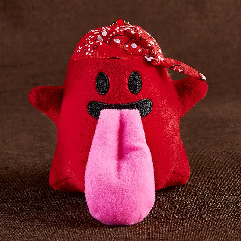 Monster Crew Plush Bag Charm featuring a red monster with a pink tongue and a bandana accessory.