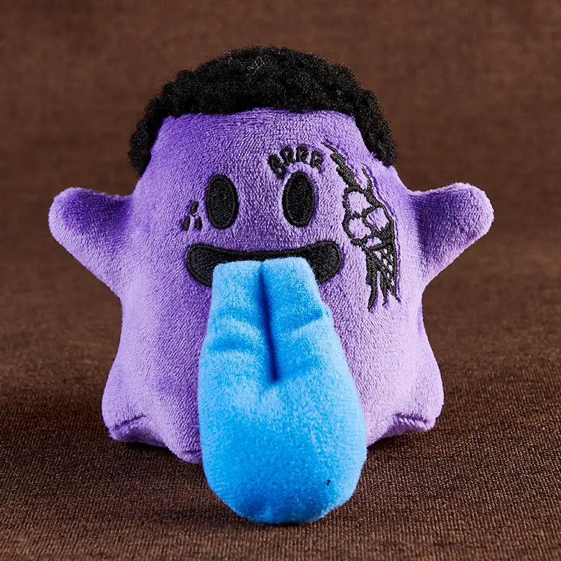 Monster Crew Plush Bag Charm featuring a cute purple monster with a blue tongue and playful design.