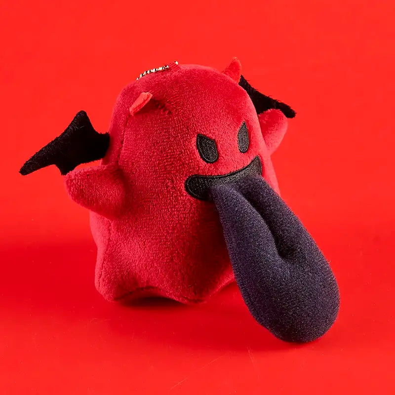 Monster Crew Plush Bag Charm featuring a cute red plush monster with black wings.