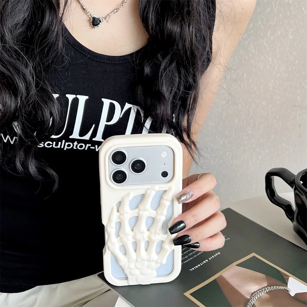 3D Skeleton Hand Gothic Phone Cover displayed on a hand, showcasing unique skeletal design and artistic style.