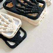 3D Skeleton Hand Gothic Phone Cover showcasing sculpted skeletal designs on black and white phone cases.