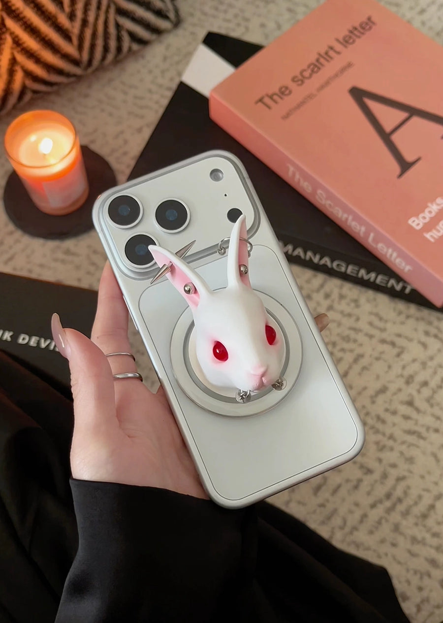 Angry Bunny MagSafe Phone Stand on a smartphone in hand, featuring a whimsical design with red eyes and a unique look.