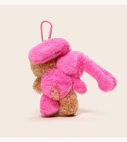 Cat Bunny Hugging Plush Charm with pink bunny hugging a brown cat, attached to a keychain for portability.