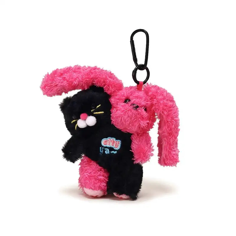Cat Bunny Hugging Plush Charm featuring a black cat and pink bunny plush on a keychain.