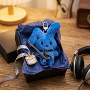 Guitarist Bunny Plush Charm in a gift box featuring a blue mochi rabbit holding a plush guitar accessory.