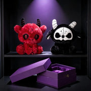 Dark Envoy Reaper Plush - Buu Evil, featuring red and black plush figures on display with a purple gift box.