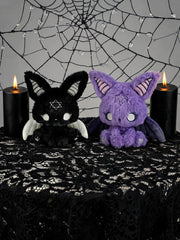 Dark Envoy Gothic Cute Plush Doll - Buu Evil duo featuring a black and purple variant on a gothic-themed table with candles.