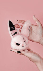 Cuddly Bunny - DarkCute BandaBun plush toy being held in hands against a pink background, featuring a cute design.